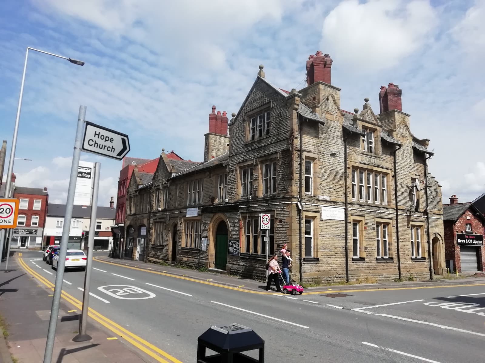 Historic stone building on a street corner